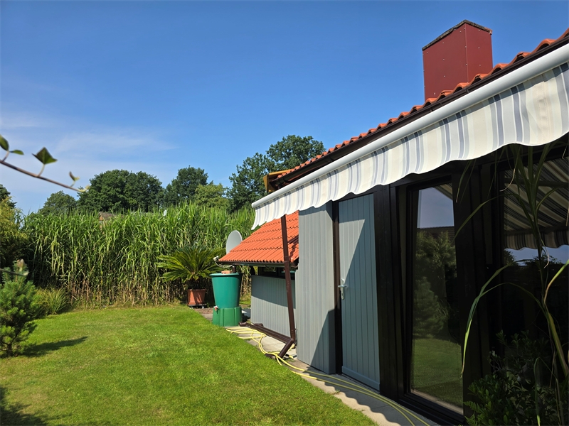 Wintergarten mir Markise Einfamilienhaus Rieste
