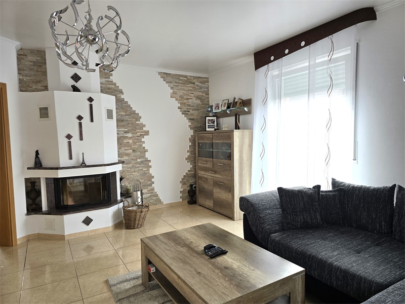 Wohnzimmer mit Kamin Einfamilienhaus Lotte