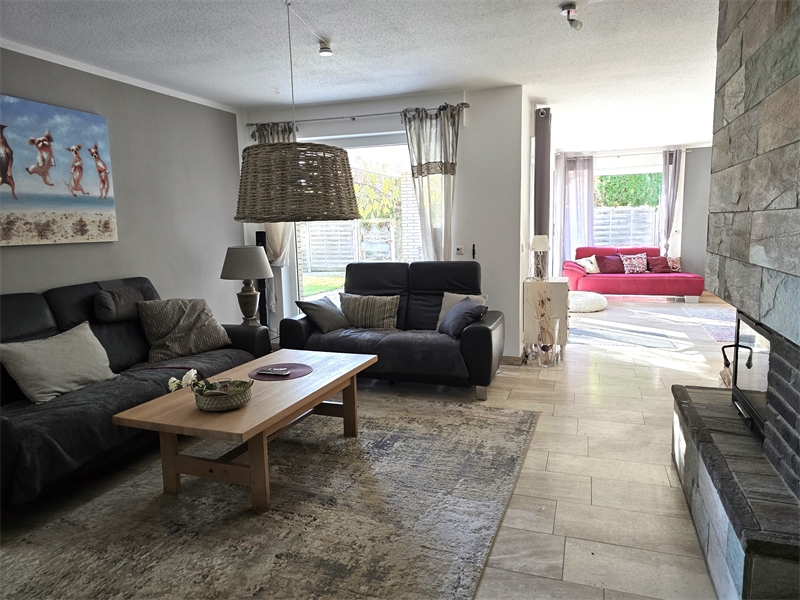Wohnbereich mit Kamin Einfamilienhaus Bad Iburg